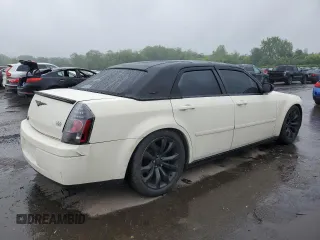 2005 Chrysler 300 300 z VIN 2C3JA43R35H175126, wystawiony jako Copart lot #58218305 z przebiegiem 167 612 mil mil oraz Szkoda całkowita • Salvage title. Historia ofert i sprzedaży dostępna na DreamBid. Obrazek 3.