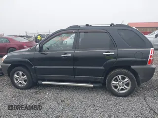 2008 Kia Sportage LX with VIN KNDJE723987527110, listed as a IAAI auction lot 42020008 with 197,810 mi miles and . Bid and sale history available at DreamBid. Image 14.
