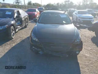 2015 Mazda Mazda3 i Touring with VIN 3MZBM1V73FM207770, listed as a IAAI auction lot 41749926 with 106,522 mi miles. Bid and sale history available at carsss.com. Image 12.