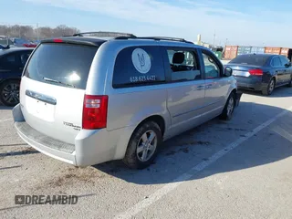 2010 Dodge Grand Caravan SXT with VIN 2D4RN5D17AR154594, listed as a IAAI auction lot 41751767 with Not Provided miles and . Bid and sale history available at DreamBid. Image 4.