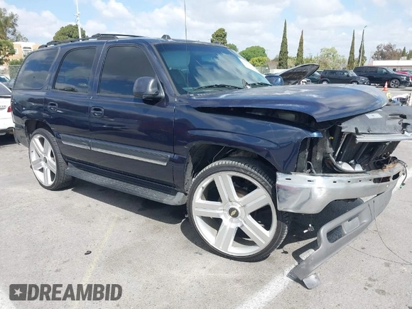 2005 Chevrolet Tahoe Z71 z VIN 1GNEC13T95R192599, wystawiony jako IAAI lot #41955397 z przebiegiem 179 292 mil mil oraz . Historia ofert i sprzedaży dostępna na DreamBid. Obrazek 1.