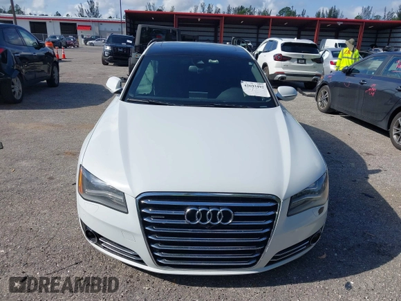 2014 Audi A8 4.0T with VIN WAUR2AFD8EN004371, listed as a IAAI auction lot 42693492 with 159,405 mi miles and . Bid and sale history available at DreamBid. Image 12.