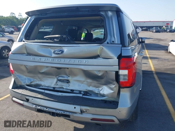 2023 Ford Expedition XLT with VIN 1FMJU1H87PEA08145, listed as a IAAI auction lot 42268401 with 42,801 mi miles and . Bid and sale history available at DreamBid. Image 6.