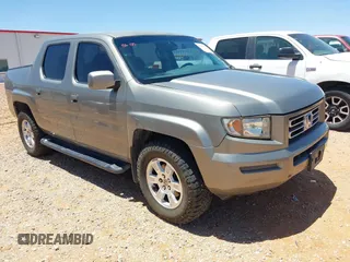 2006 Honda Ridgeline RTL z VIN 2HJYK16556H548730, wystawiony jako IAAI lot #42409877 z przebiegiem 201 729 mil mil oraz . Historia ofert i sprzedaży dostępna na DreamBid. Obrazek 1.