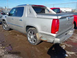 2008 Cadillac Escalade EXT z VIN 3GYFK62828G128252, wystawiony jako IAAI lot #41409193 z przebiegiem 151 328 mil mil oraz . Historia ofert i sprzedaży dostępna na DreamBid. Obrazek 3.