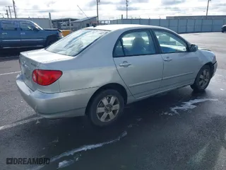 2004 Toyota Corolla CE with VIN 1NXBR38E34Z277929, listed as a IAAI auction lot 41807213 with 197,757 mi miles. Bid and sale history available at carsss.com. Image 4.