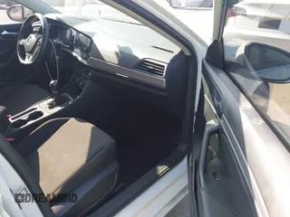 2019 Volkswagen Jetta S with VIN 3VWN57BU4KM177874, listed as a IAAI auction lot 42386870 with 102,334 mi miles and . Bid and sale history available at DreamBid. Image 5.