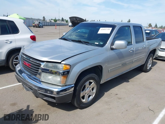 2010 GMC Canyon SLE1 with VIN 1GTDSCDEXA8138621, listed as a IAAI auction lot 42042749 with 169,354 mi miles. Bid and sale history available at carsss.com. Image 2.