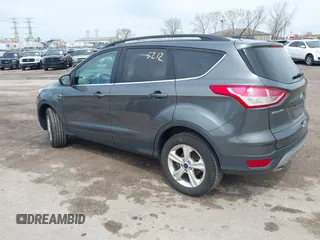 2016 Ford Escape SE with VIN 1FMCU9GX0GUC21749, listed as a IAAI auction lot 42115212 with 149,027 mi miles. Bid and sale history available at carsss.com. Image 3.