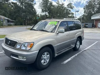 1998 Lexus LX 470 z VIN JT6HT00W7W0008417, wystawiony jako Copart lot #79324334 z przebiegiem 183 911 mil mil oraz Czysty tytuł • Clean title. Historia ofert i sprzedaży dostępna na DreamBid. Obrazek 2.