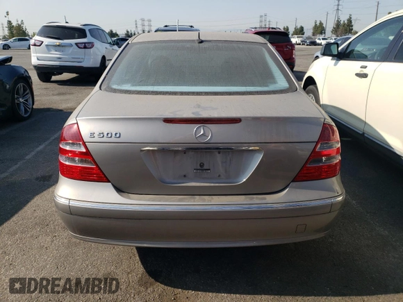 2005 Mercedes-Benz E 5.0L with VIN WDBUF70J75A693702, listed as a Copart auction lot 63497604 with 122,410 mi miles and Clean Title. Bid and sale history available at carsss.com. Image 6.