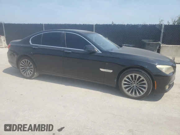 2012 BMW 7 Series 740i with VIN WBAKA4C56CC613745, listed as a Copart auction lot 57342795 with 139,889 mi miles and Clean title. Bid and sale history available at DreamBid. Image 4.