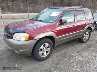 2003 Mazda Tribute ES with VIN 4F2CZ96103KM01371, listed as a IAAI auction lot 41379492 with 196,083 mi miles. Bid and sale history available at carsss.com. Image 19.