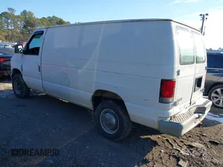 1999 Ford Econoline Cargo Commercial with VIN 1FTNE24L6XHB25183, listed as a IAAI auction lot 41391984 with 205,804 mi miles and . Bid and sale history available at carsss.com. Image 3.
