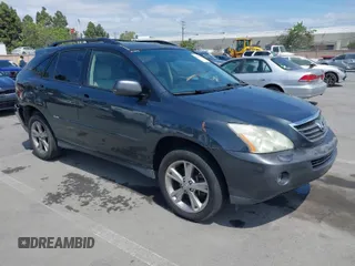 2007 Lexus RX 400h with VIN JTJGW31U372001817, listed as a IAAI auction lot 42047143 with 155,767 mi miles and . Bid and sale history available at DreamBid. Image 1.