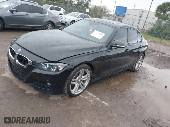 2013 BMW 3 Series 328i with VIN WBA3C1G52DNN93698, listed as a IAAI auction lot 41673985 with 160,233 mi miles and . Bid and sale history available at DreamBid. Image 2.