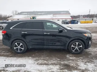 2016 Kia Sorento EX with VIN 5XYPH4A1XGG023621, listed as a IAAI auction lot 41583266 with 123,039 mi miles. Bid and sale history available at carsss.com. Image 13.