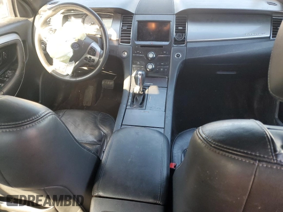 2013 Ford Taurus SEL with VIN 1FAHP2E87DG108577, listed as a Copart auction lot 88561905 with 146,289 mi miles and Salvage Title. Bid and sale history available at DreamBid. Image 8.