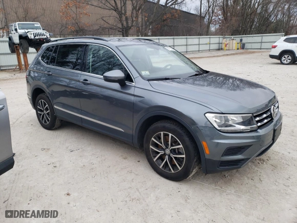 2021 Volkswagen Tiguan SE with VIN 3VV2B7AX7MM116517, listed as a Copart auction lot 84715604 with 67,797 mi miles and Salvage Title. Bid and sale history available at carsss.com. Image 4.
