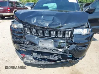 2018 Jeep Grand Cherokee Upland with VIN 1C4RJFAG2JC350975, listed as a IAAI auction lot 42612836 with 148,435 mi miles and . Bid and sale history available at DreamBid. Image 6.