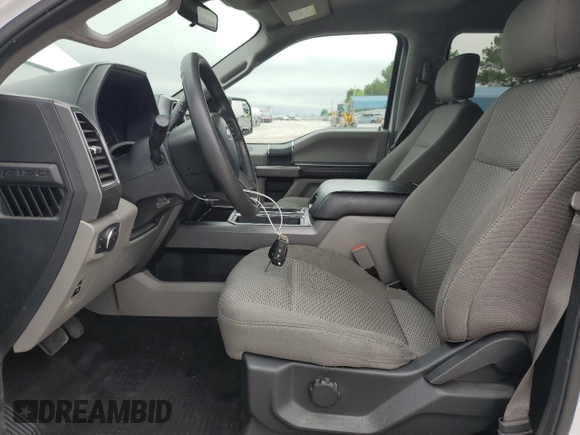 2020 Ford F-150 XL with VIN 1FTEW1E43LKD42136, listed as a Copart auction lot 59444145 with 142,294 mi miles and Salvage title. Bid and sale history available at DreamBid. Image 7.