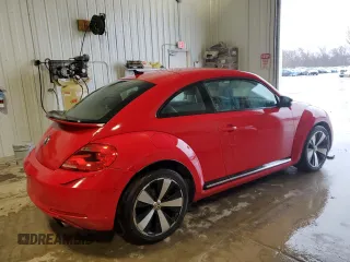 2012 Volkswagen Beetle 2.0T Black Turbo Launch Edition PZEV with VIN 3VWVA7AT8CM607203, listed as a Copart auction lot 47852705 with 119,477 mi miles and Clean Title. Bid and sale history available at carsss.com. Image 3.