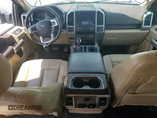 2020 Ford F-150 XL with VIN 1FTEW1E57LKF51467, listed as a Copart auction lot 61956535 with 61,495 mi miles and Salvage title. Bid and sale history available at DreamBid. Image 8.