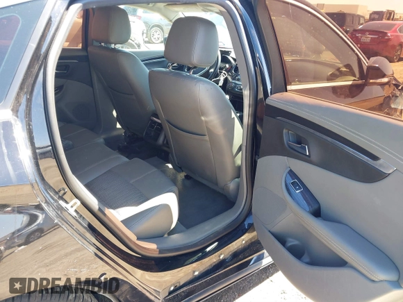 2017 Chevrolet Impala LT with VIN 1G1105S39HU189768, listed as a IAAI auction lot 41762234 with 165,927 mi miles and . Bid and sale history available at DreamBid. Image 8.