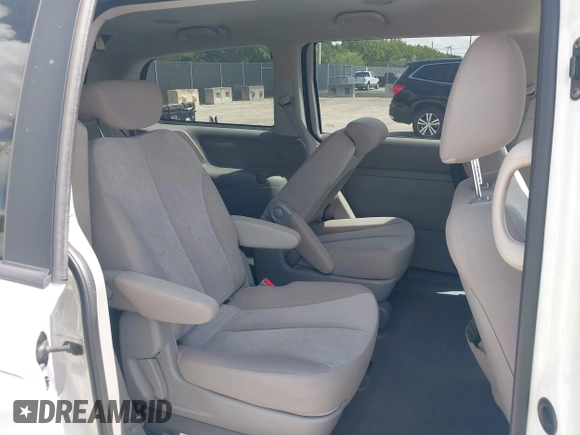 2010 Kia Sedona LX with VIN KNDMG4C33A6338047, listed as a IAAI auction lot 42128485 with 99,498 mi miles and . Bid and sale history available at carsss.com. Image 8.