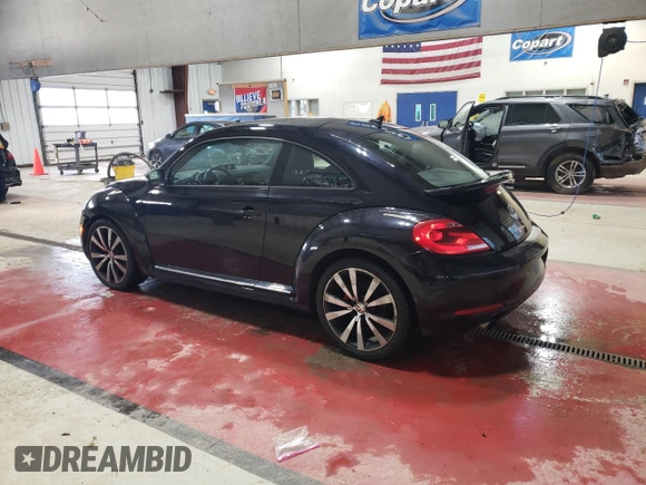 2012 Volkswagen Beetle Turbo with VIN 3VWVA7AT4CM665261, listed as a Copart auction lot 50562025 with 62,570 mi miles and Salvage Title. Bid and sale history available at DreamBid. Image 2.