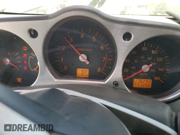 2003 Nissan 350Z Touring z VIN JN1AZ34E63T016212, wystawiony jako Copart lot #53799605 z przebiegiem 176 292 mil mil oraz Czysty tytuł • Clean title. Historia ofert i sprzedaży dostępna na DreamBid. Obrazek 9.