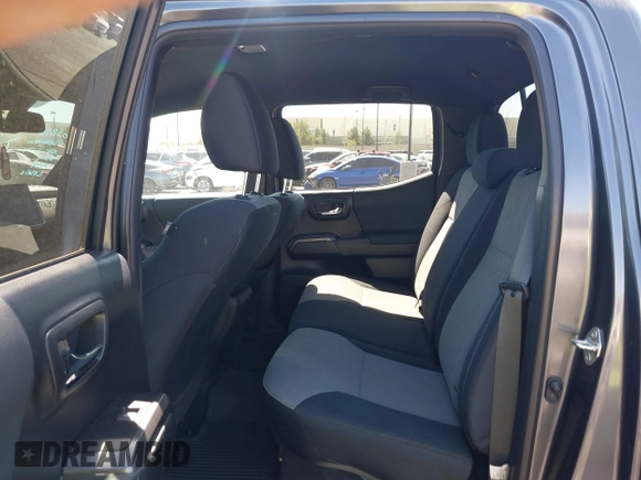 2021 Toyota Tacoma SR5 с VIN 3TMDZ5BN6MM099584, выставлен на аукционе IAAI как лот 41848068 с пробегом 28 556 миль миль и . История ставок и продаж доступна на DreamBid. Изображение 8.
