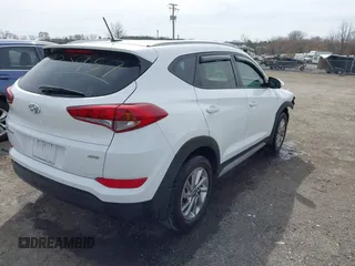 2017 Hyundai Tucson SE with VIN KM8J3CA44HU437644, listed as a IAAI auction lot 41825957 with 59,402 mi miles. Bid and sale history available at carsss.com. Image 4.