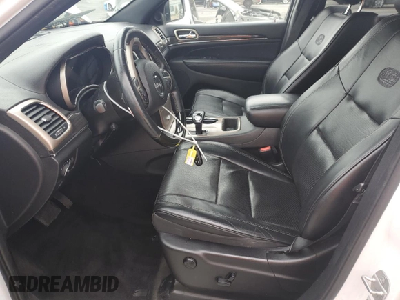 2015 Jeep Grand Cherokee Overland with VIN 1C4RJECG7FC872175, listed as a Copart auction lot 50653205 with 117,433 mi miles and Salvage title. Bid and sale history available at DreamBid. Image 7.
