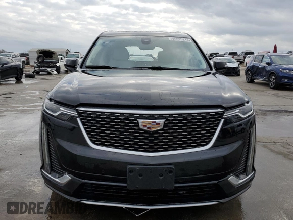 2021 Cadillac XT6 Premium Luxury z VIN 1GYKPCRS6MZ207546, wystawiony jako Copart lot #85995814 z przebiegiem 30 885 mil mil oraz Czysty tytuł • Clean title. Historia ofert i sprzedaży dostępna na DreamBid. Obrazek 5.