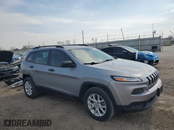 2015 Jeep Cherokee Sport with VIN 1C4PJMAB3FW615621, listed as a Copart auction lot 52330115 with 160,739 mi miles and Salvage title. Bid and sale history available at DreamBid. Image 4.