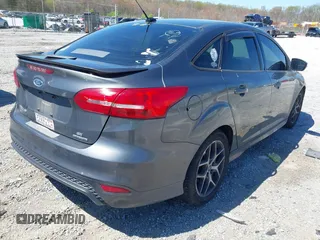 2016 Ford Focus SE with VIN 1FADP3F25GL355462, listed as a IAAI auction lot 41868865 with 212,366 mi miles. Bid and sale history available at carsss.com. Image 4.