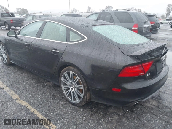 2014 Audi A7 3.0 Prestige with VIN WAU2GAFC5EN090233, listed as a IAAI auction lot 41565942 with 199,890 mi miles. Bid and sale history available at carsss.com. Image 3.