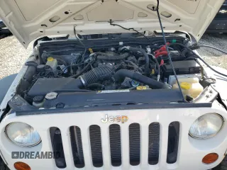 2008 Jeep Wrangler X with VIN 1J4FZ24128L612526, listed as a Copart auction lot 49152275 with 128,584 mi miles and Clean title. Bid and sale history available at DreamBid. Image 11.