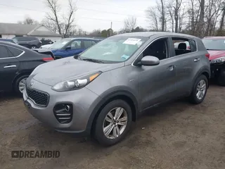 2018 Kia Sportage LX with VIN KNDPMCAC7J7393243, listed as a IAAI auction lot 41484579 with 122,022 mi miles. Bid and sale history available at carsss.com. Image 2.