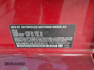 2018 BMW 3 Series 330i with VIN WBA8B9C58JEE83010, listed as a IAAI auction lot 41950220 with 94,871 mi miles and . Bid and sale history available at DreamBid. Image 9.