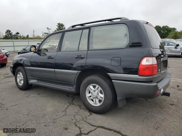 2000 Lexus LX 470 with VIN JT6HT00W9Y0103600, listed as a Copart auction lot 72595294 with 141,676 mi miles and Salvage Title. Bid and sale history available at carsss.com. Image 2.