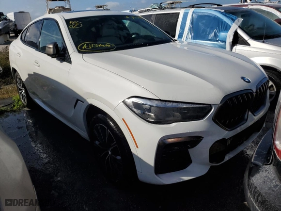 2022 BMW X6 M50i with VIN 5UXCY8C07N9K86690, listed as a Copart auction lot 74115254 with 0 mi miles and Salvage Title. Bid and sale history available at carsss.com. Image 4.