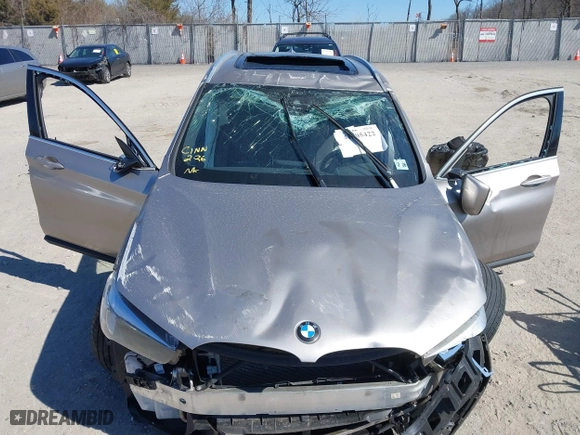 2021 BMW X1 xDrive28i with VIN WBXJG9C06M5S85511, listed as a IAAI auction lot 41705422 with 30,636 mi miles. Bid and sale history available at carsss.com. Image 6.