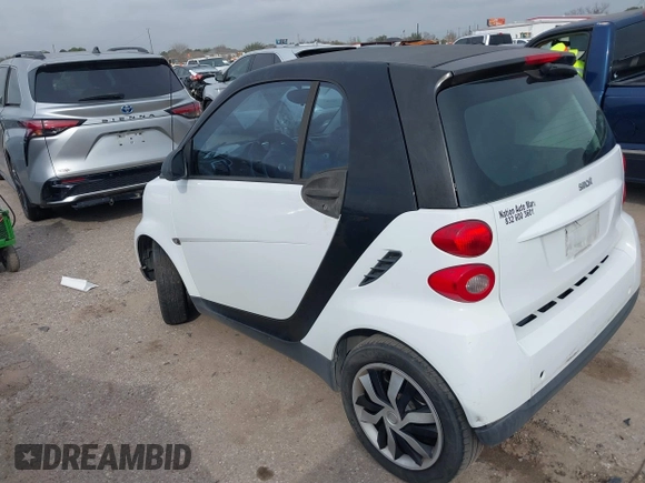2010 Smart fortwo Pure with VIN WMEEJ3BA5AK390904, listed as a IAAI auction lot 41688922 with Not provided miles and . Bid and sale history available at DreamBid. Image 3.