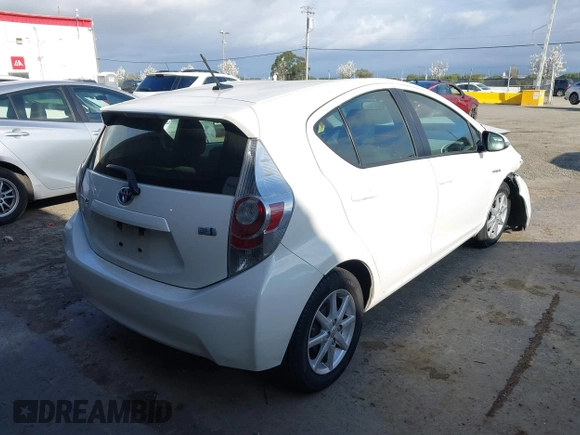 2012 Toyota Prius c One with VIN JTDKDTB38C1514005, listed as a IAAI auction lot 41903868 with 62,344 mi miles. Bid and sale history available at carsss.com. Image 4.