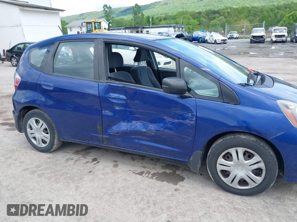 2009 Honda Fit with VIN JHMGE882X9S058976, listed as a IAAI auction lot 42202305 with 121,633 mi miles and . Bid and sale history available at DreamBid. Image 6.