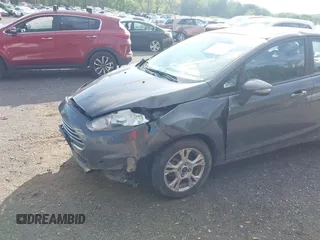 2016 Ford Fiesta SE z VIN 3FADP4BJ8GM184675, wystawiony jako IAAI lot #42169234 z przebiegiem 54 231 mil mil oraz . Historia ofert i sprzedaży dostępna na DreamBid. Obrazek 6.
