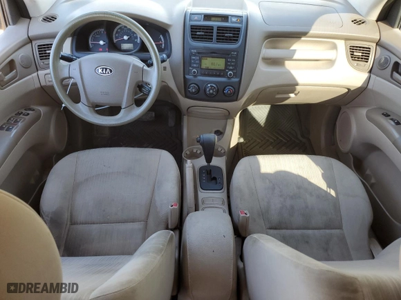 2009 Kia Sportage LX with VIN KNDJF724X97557126, listed as a Copart auction lot 48598065 with 201,898 mi miles and Salvage Title. Bid and sale history available at carsss.com. Image 8.