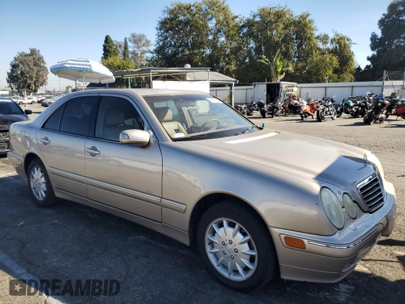2000 Mercedes-Benz E-Class AWD with VIN WDBJF82G0YX029026, listed as a Copart auction lot 78106604 with 134,482 mi miles and Salvage Title. Bid and sale history available at carsss.com. Image 4.